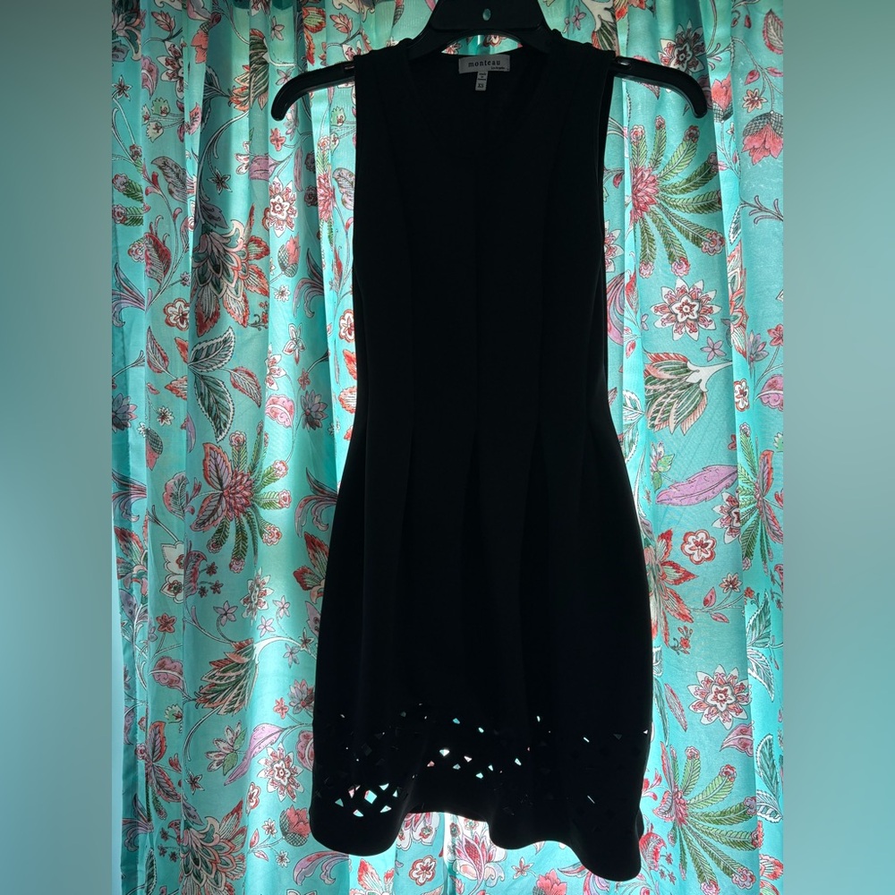 Everyone Needs A Little Black Dress
Monteau Black Sleeveless Mini Dress